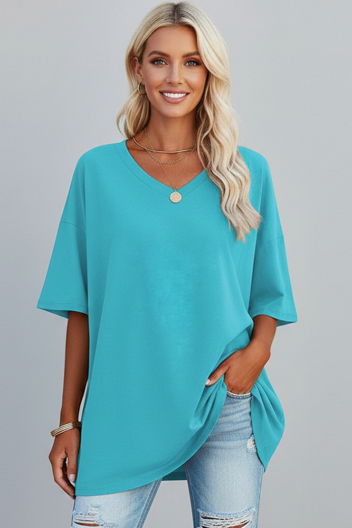 Stylish women's V-neck short sleeve t-shirt with a comfortable gathered hem.