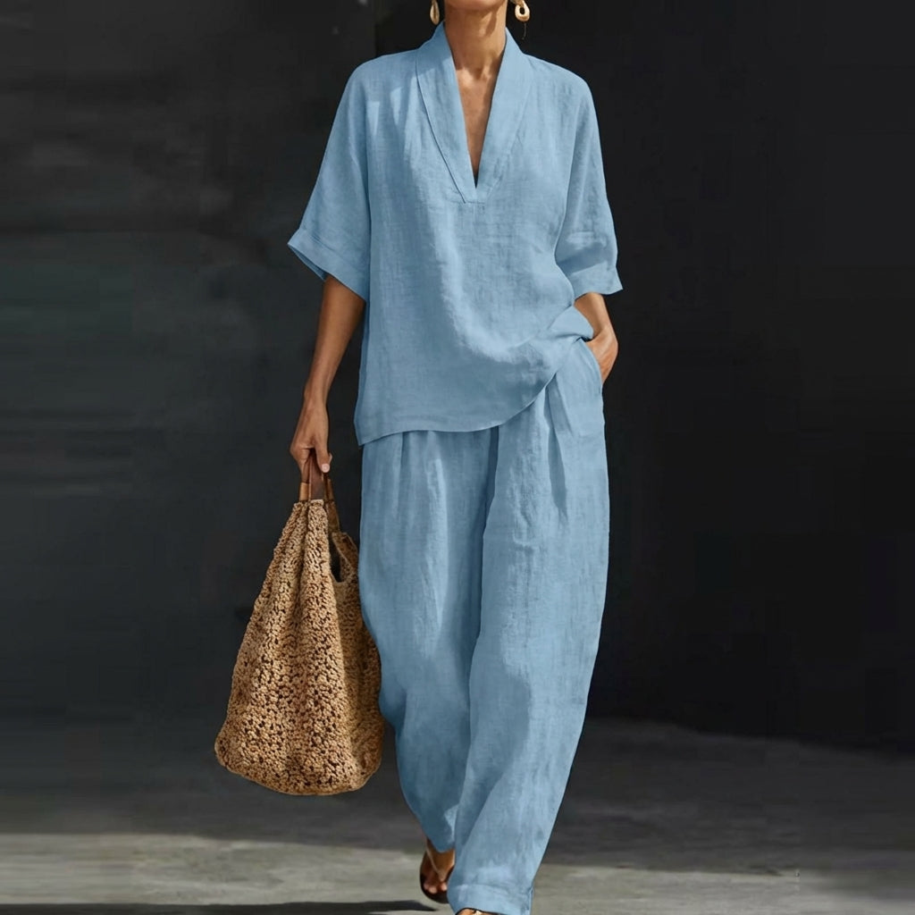 Women's relaxed V-neck top & wide-leg pants two-piece set. Comfortable, casual chic, perfect for everyday wear.