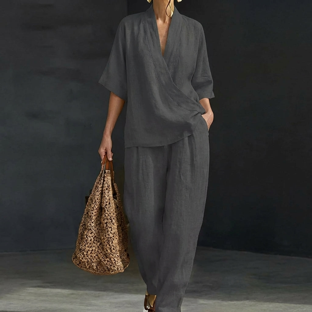 Casual chic women's relaxed two-piece set. Includes a comfortable V-neck top and trendy wide-leg pants.
