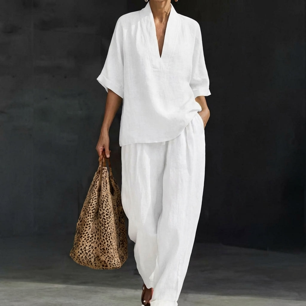 Everyday fashion women's two-piece set: relaxed V-neck top & wide-leg pants. Cozy matching outfit for women.