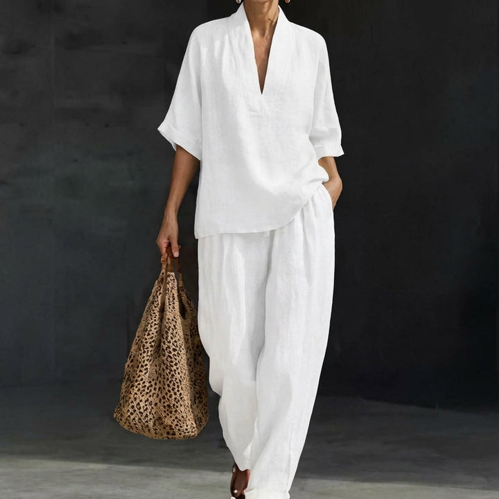 Everyday fashion women's two-piece set: relaxed V-neck top & wide-leg pants. Cozy matching outfit for women.