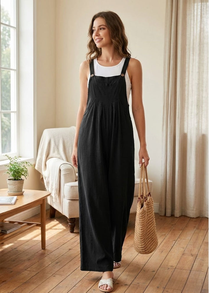 Women's relaxed wide leg jumpsuit, perfect for summer casual wear. Features adjustable straps & practical pockets.
