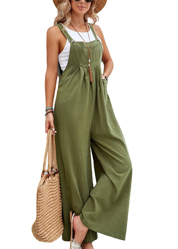 Women's one-piece wide leg jumpsuit featuring adjustable straps, a relaxed fit, and deep side pockets.