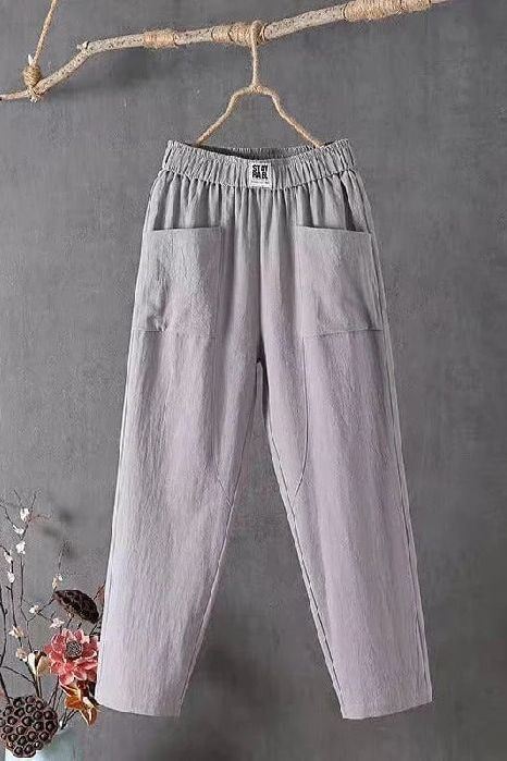 Comfortable women's wide-leg pants with an elastic waist and relaxed, loose fit for effortless everyday wear.