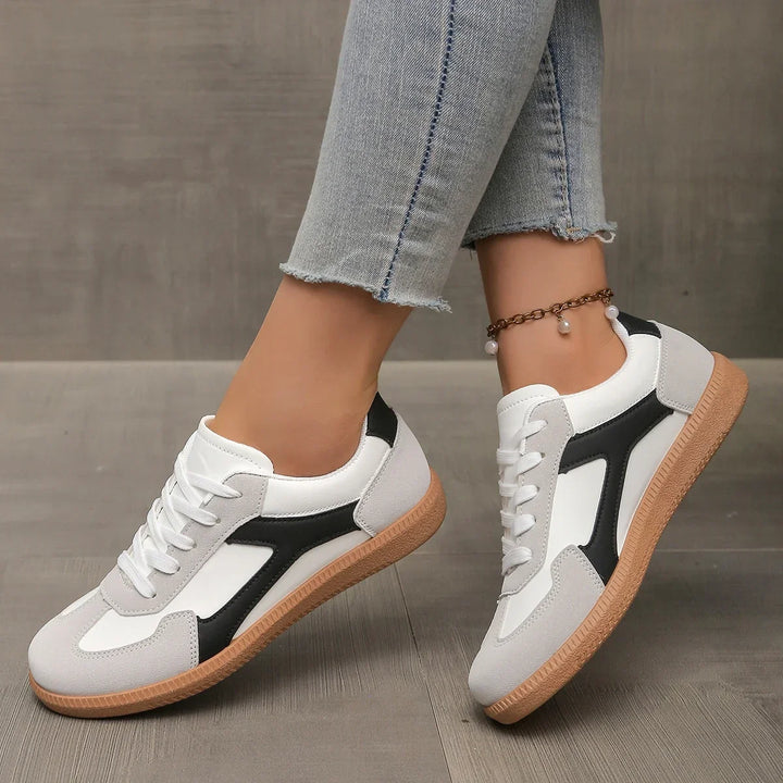 Fashionable women's everyday sneakers, combining a retro low profile with a supportive cushioned gum sole.