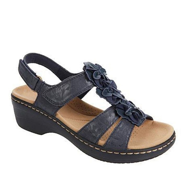 Floral peep-toe retro sandals, comfortable summer footwear with a chic wedge heel.