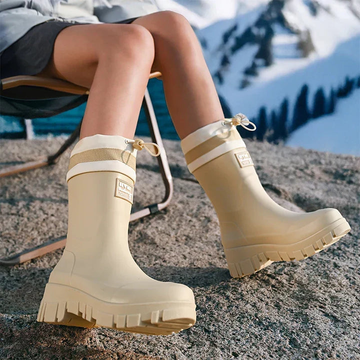 Vintage-inspired women's waterproof rain boots with anti-slip sole. Great for autumn outdoor fashion.