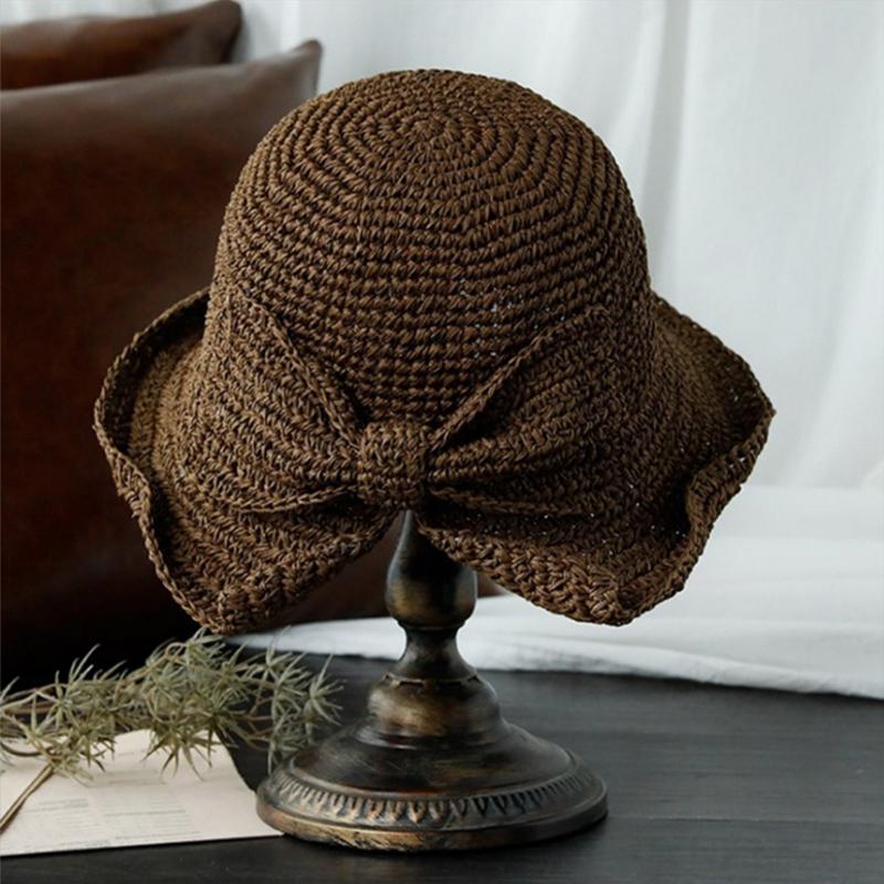 Elegant women's beach hat: wide brim and fetching bow, a perfect summer accessory