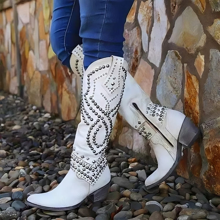 Women's Riloh orthopedic knee-high boots with a stylish pointed toe & comfortable mid-block heel. Side zipper detail.