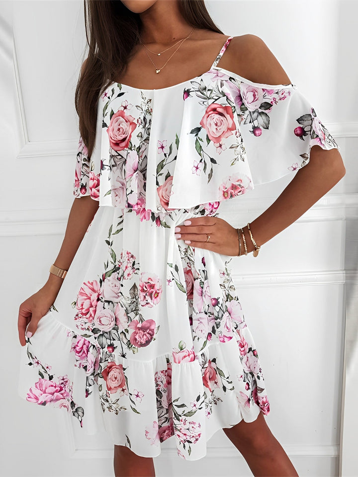 Flowy floral cold shoulder mini dress for women, excellent vacation wear or casual beach resort attire.