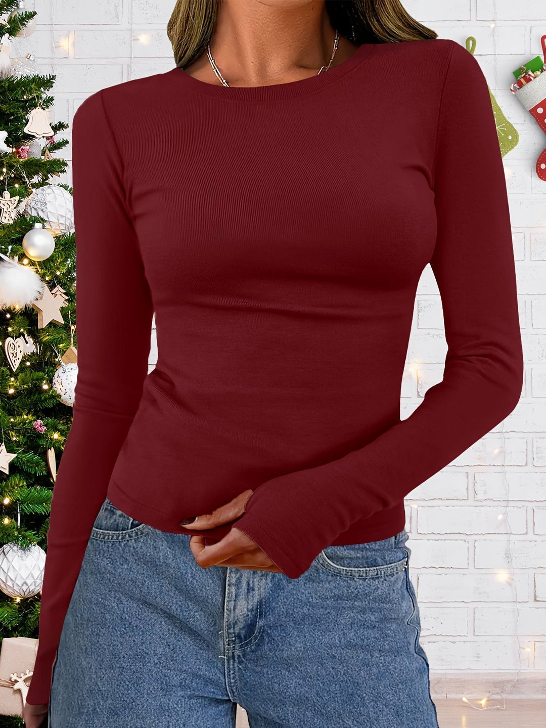 Cozy ladies' long sleeve round neck top, perfect for stylish autumn and winter outfits.