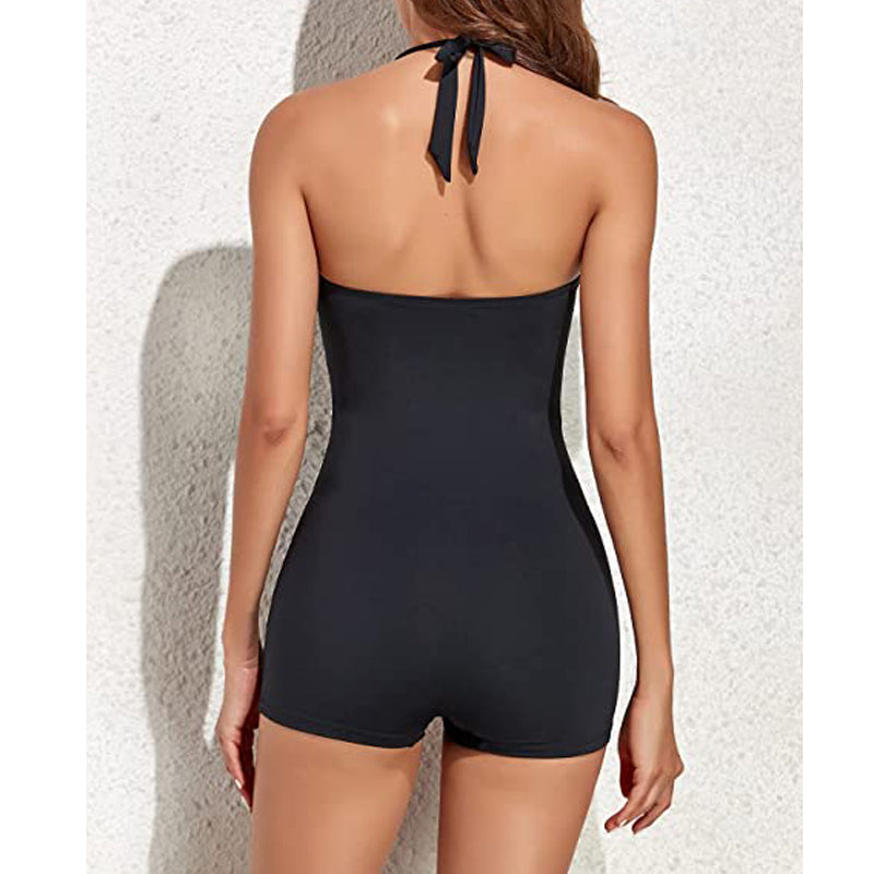 Vintage-style ruched women's halter one-piece swimsuit with sweetheart neckline and modest boyleg for resort.