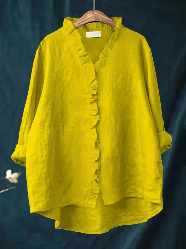 Versatile women's ruffle neck blouse, a lightweight & relaxed fit summer top for everyday or elegant wear.