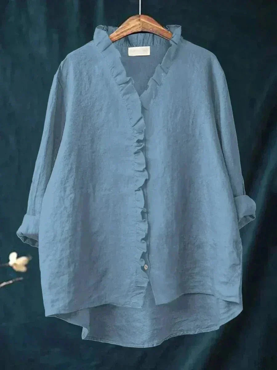 Stylish women's summer top featuring a ruffle neck and relaxed fit for chic, comfortable fashion.