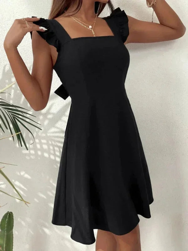 Elegant Ruffle Strap A-Line Mini Dress on a mannequin, showcasing its exquisite design.