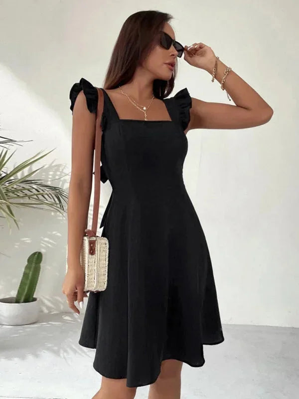 Women's Ruffle Strap A-line Mini Dress, distinct bow back adds a unique and charming touch.