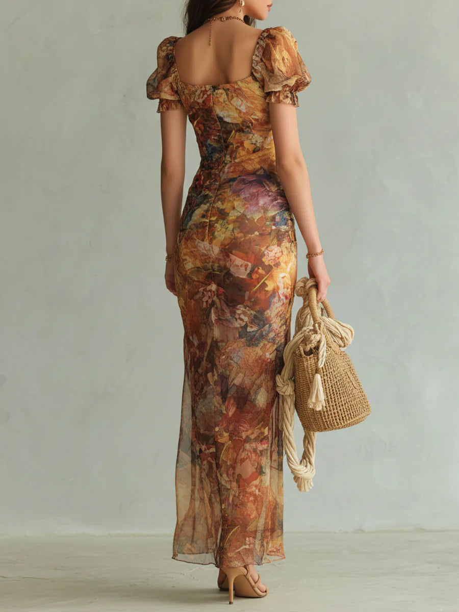 Flowing floral print maxi dress with sweetheart neckline & ruffles; perfect elegant summer vacation attire.