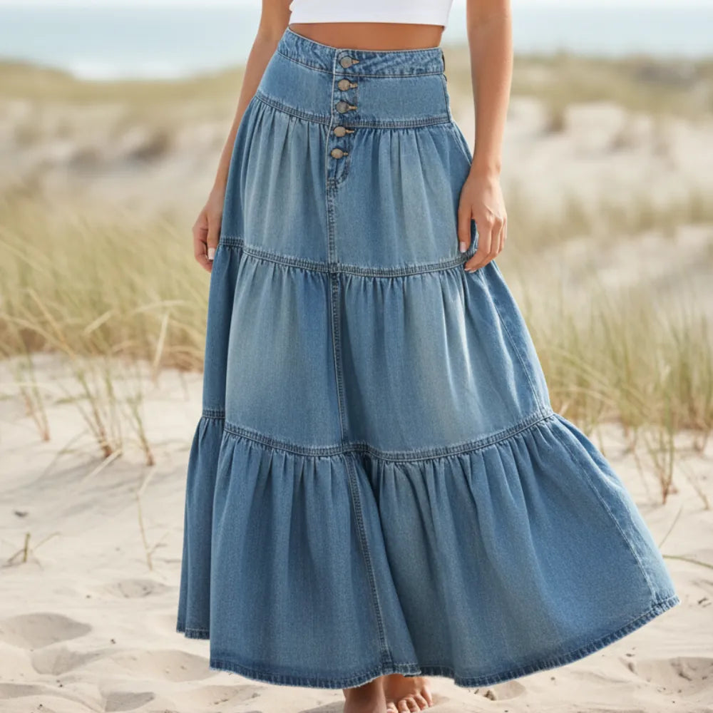 Women's ruffled high-waist maxi skirt, perfect for festival fashion & bohemian summer style. Flowy A-line design.