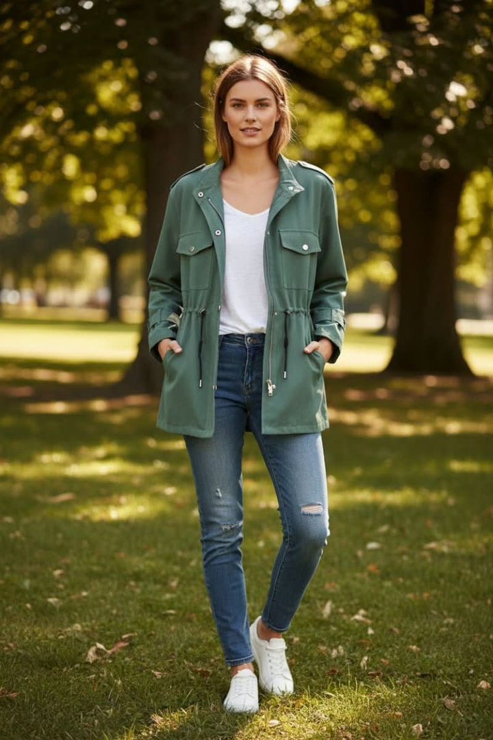 Detailed view of a women's rugged utility jacket, showing the unique chic open back for fashion layering.