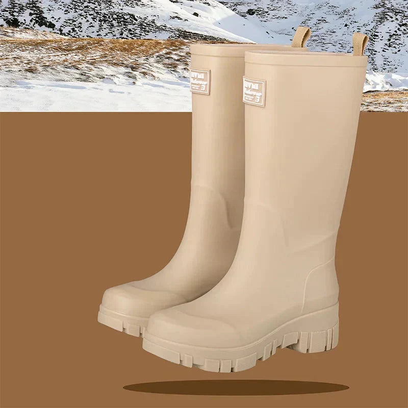 Women's waterproof Chelsea ankle boots with block heel. Stylish rain boots for autumn & winter.