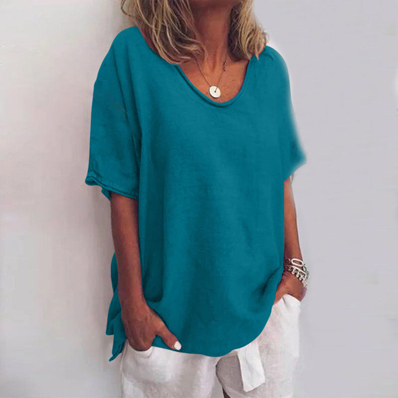 Modern women's loose blouse with a scoop neck and short sleeves, an essential for a comfortable, casual wardrobe.