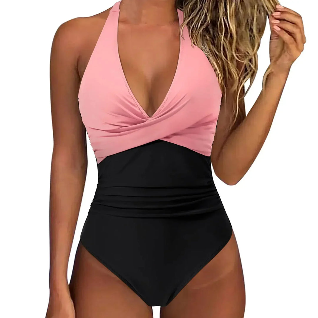 Embrace vacation style with this women's sculpting one piece swimsuit and its chic halter neck.