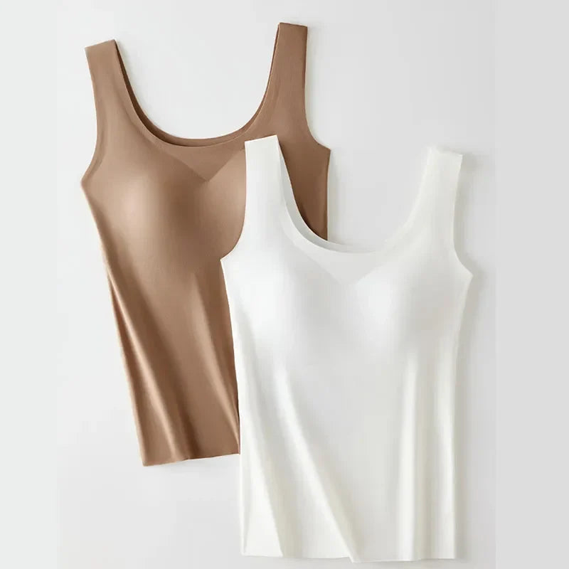 Cool, smooth women's seamless tank top with integrated padded bra. Enjoy ultimate comfort all day long.