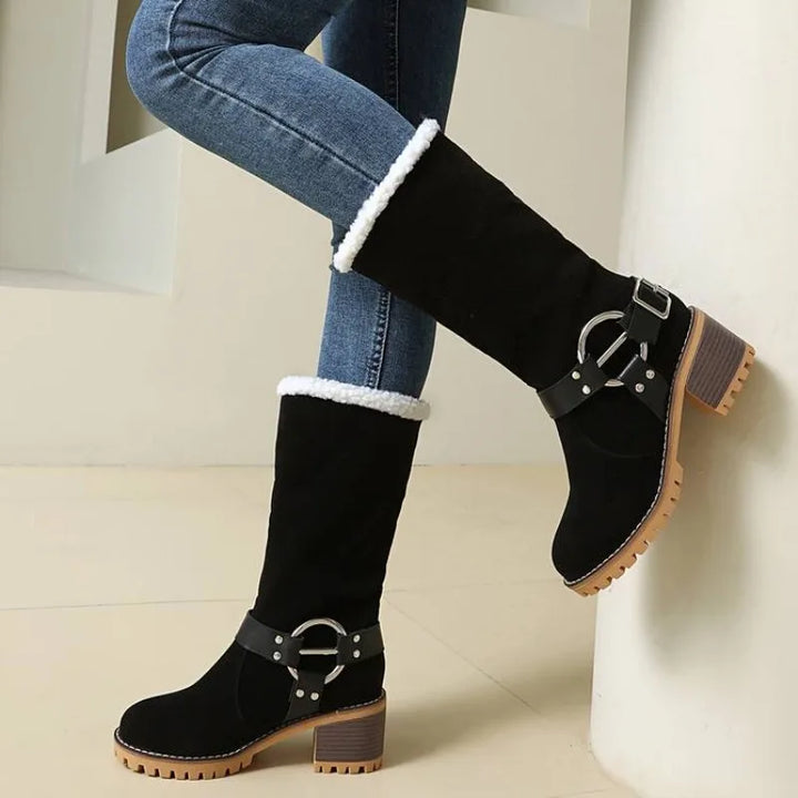 Model wearing women's sherpa lined ankle boots, styling winter fashion
