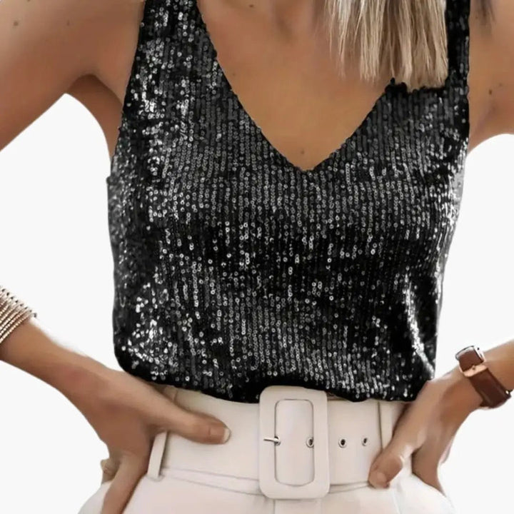 Chic women's shimmering sequin top with a round neck, sleeveless, versatile for parties & elegant casual.