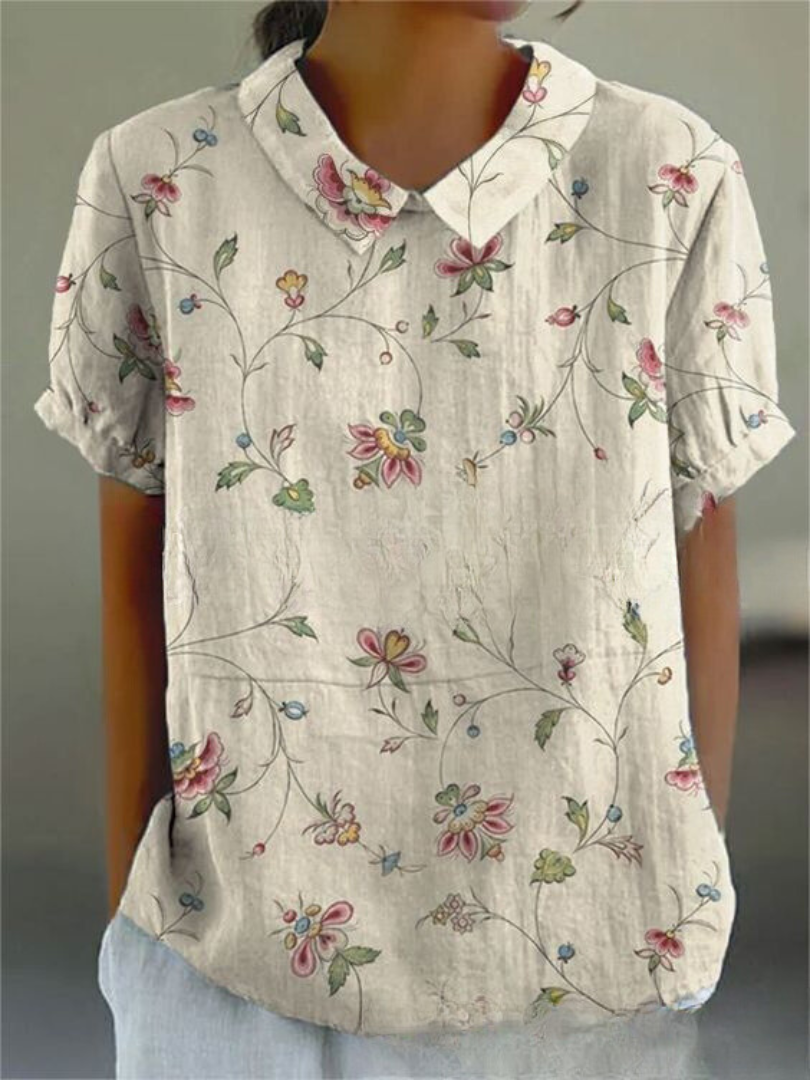 Casual women's short sleeve floral top, a chic printed blouse for comfortable spring and summer style.