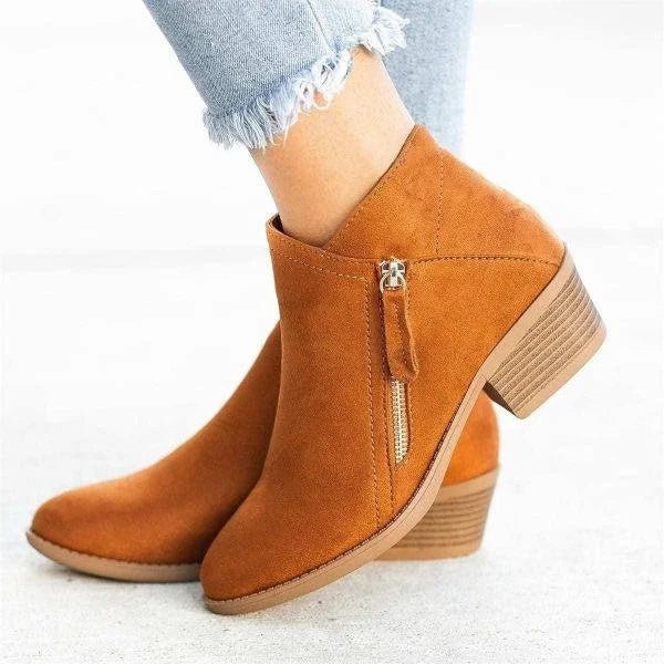 Beige women's block heel ankle boots with side zipper closure. Comfortable and versatile for everyday fashion.