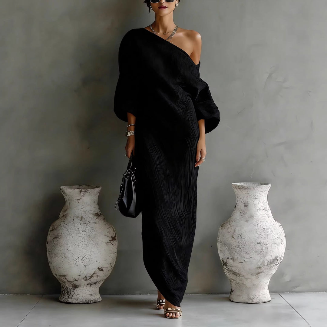 Flowy women's summer maxi dress featuring a chic slanted neck and trendy lantern sleeves, loose fit.