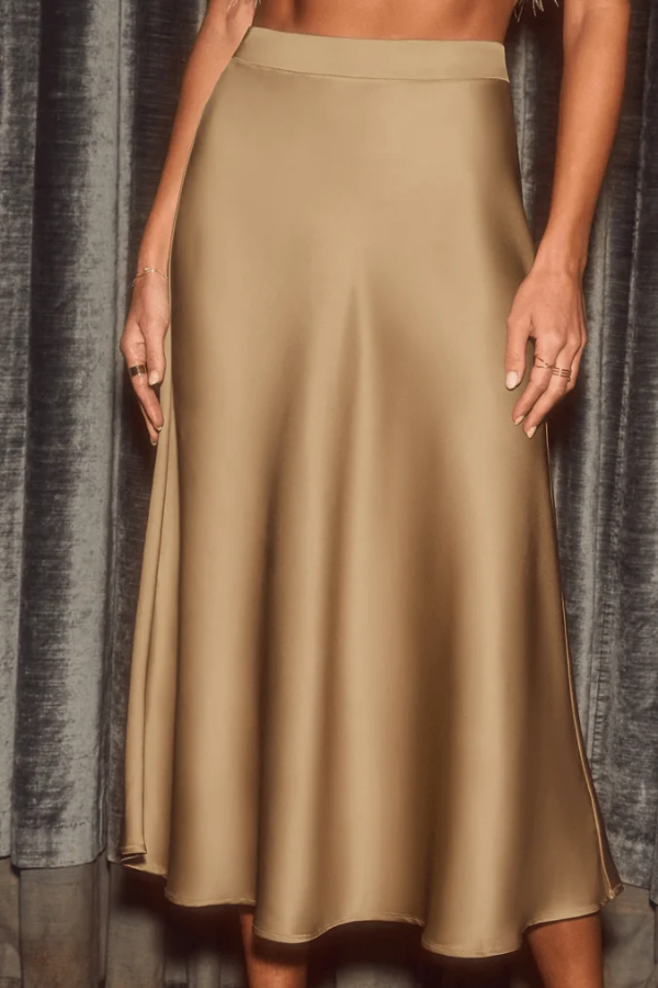 Women's sleek flowy midi skirt, perfect for elegant office wear or sophisticated evening events.