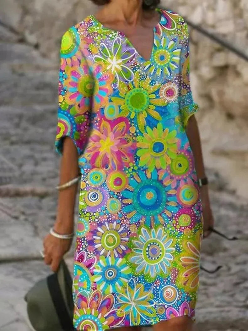 Elegant women's sleeveless floral maxi dress with a flowy silhouette, ideal for warm weather fashion.