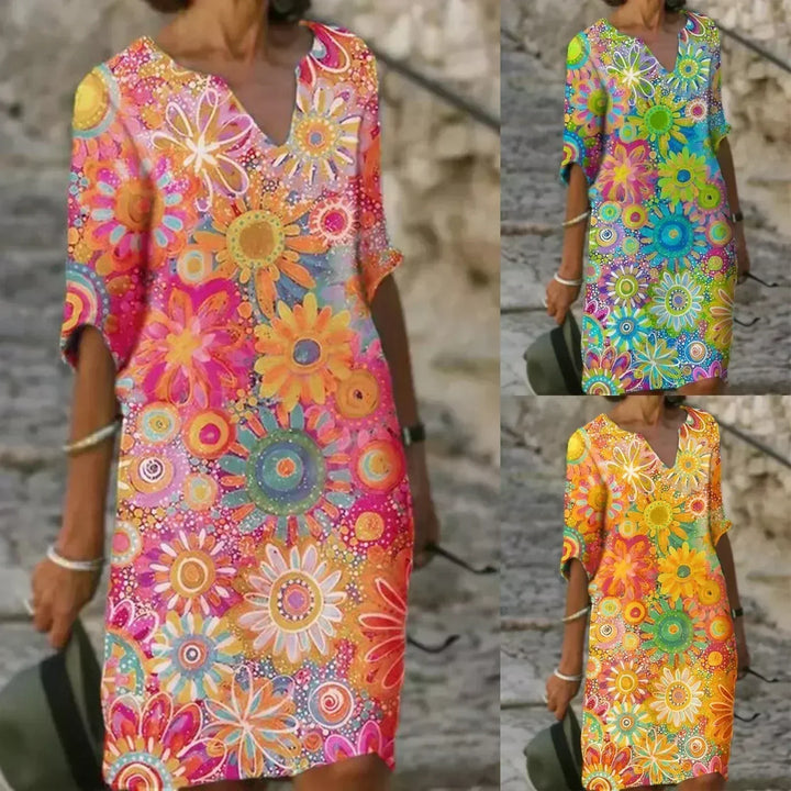 Comfortable women's floral sleeveless day dress with a breezy flowy fit, great for casual summer wear.