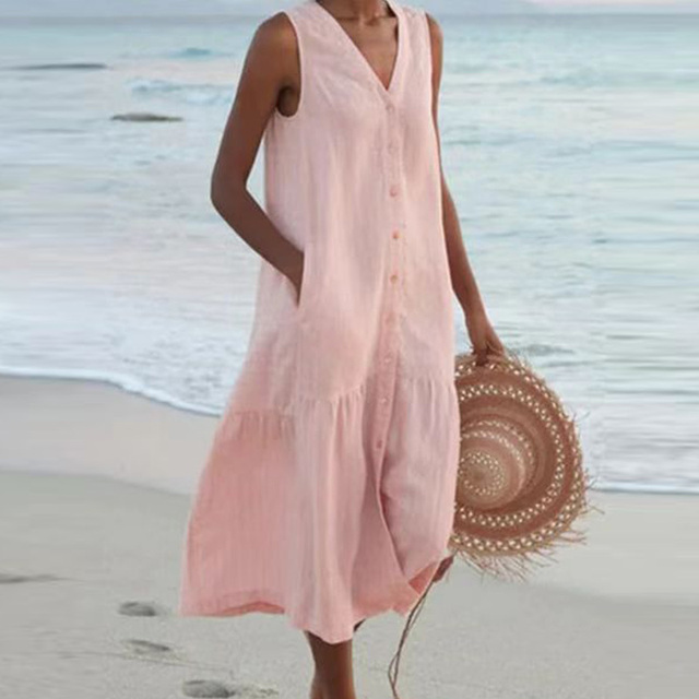 Casual women's sleeveless midi day dress with V-neck, button-front, and tiered hem. Versatile summer essential.