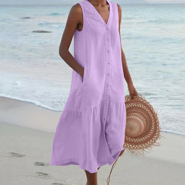 Chic women's sleeveless midi dress. This elegant V-neck, button-front, tiered style is perfect for various occasions.