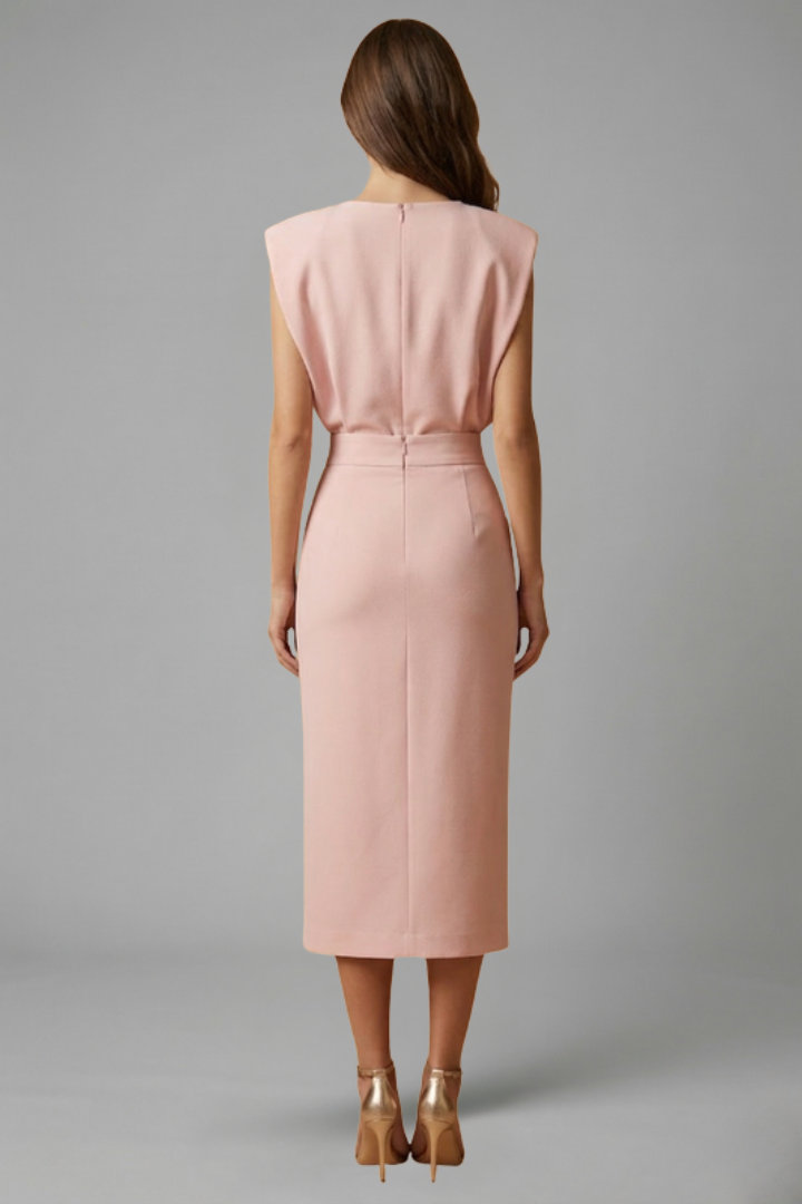 Spring/Summer women's midi dress, sleeveless design, unique side button slit. Offers a chic, modern look.