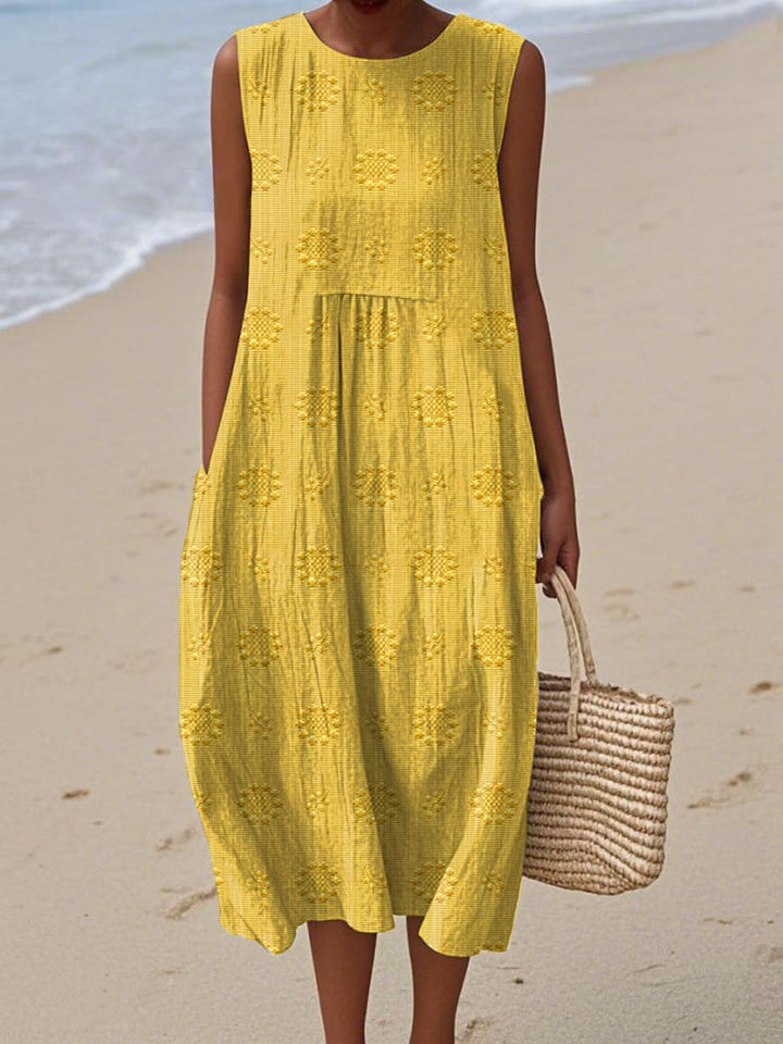 Casual women's sleeveless midi dress with pockets, ideal for summer, vacation, or everyday wear.