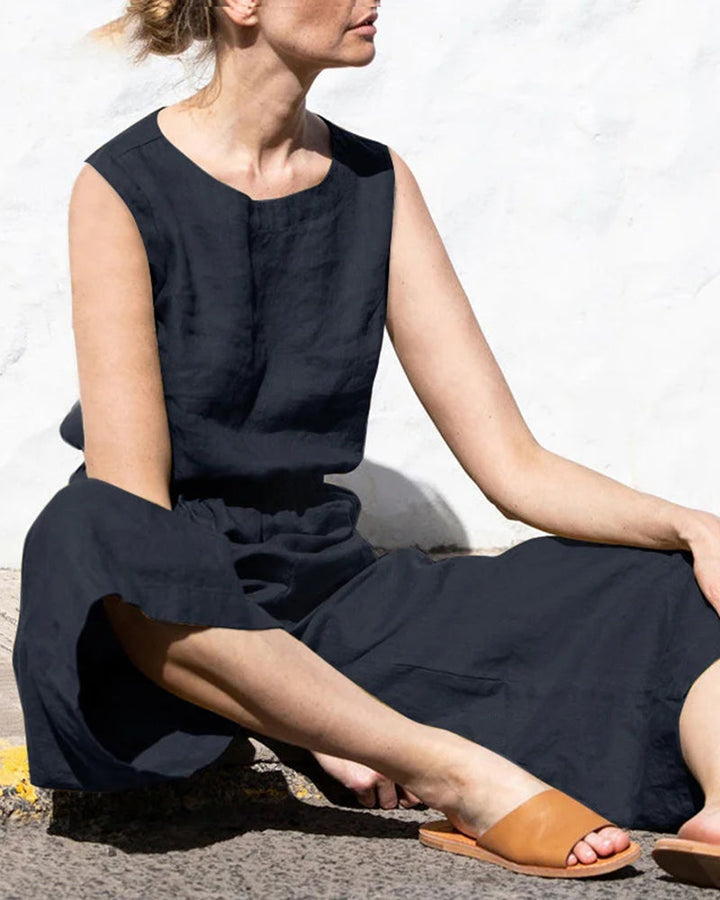 Lightweight women's sleeveless wide leg jumpsuit, perfect for warm weather. Casual & elegant summer wear.