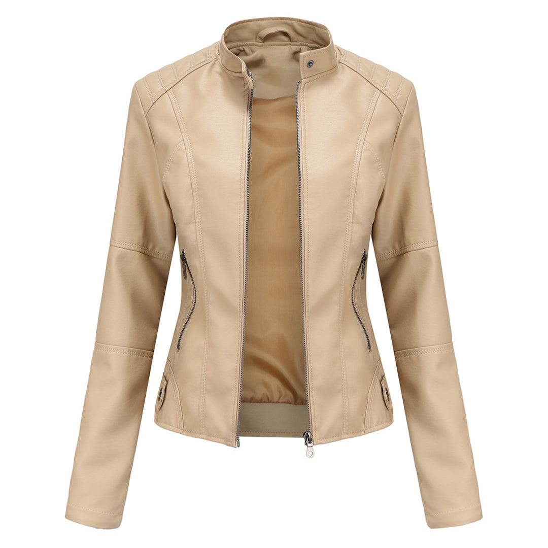 Close-up of the collar and zipper on a women's black faux leather slim-fit biker jacket