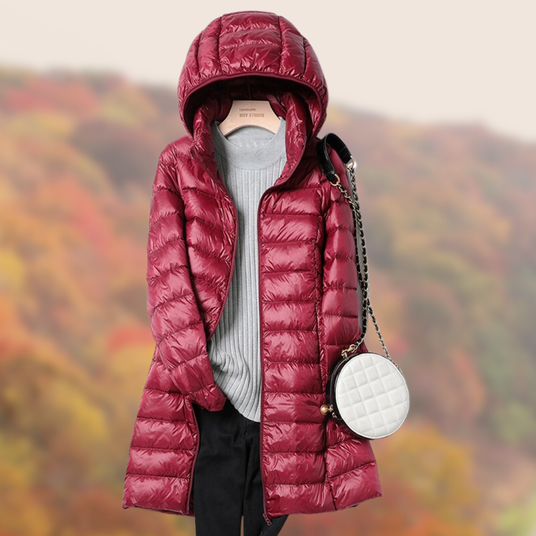 Versatile women's outerwear: a warm, lightweight, and slim-fit hooded puffer jacket