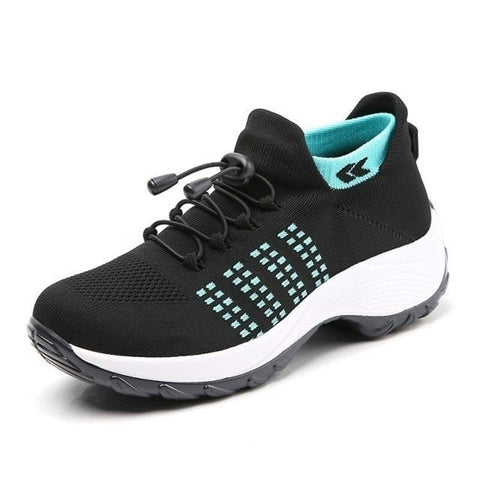 Flexible women's slip-on shoes with soft cushioning & breathable mesh for comfortable walking.