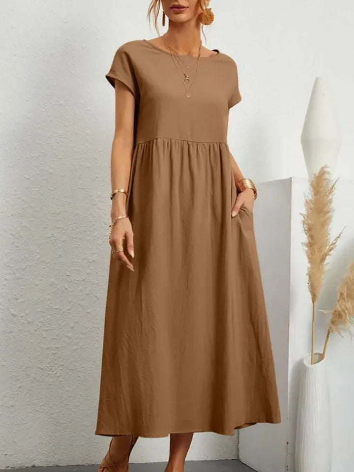 Lightweight short sleeve smock waist maxi dress, a comfortable women's summer outfit for everyday style.