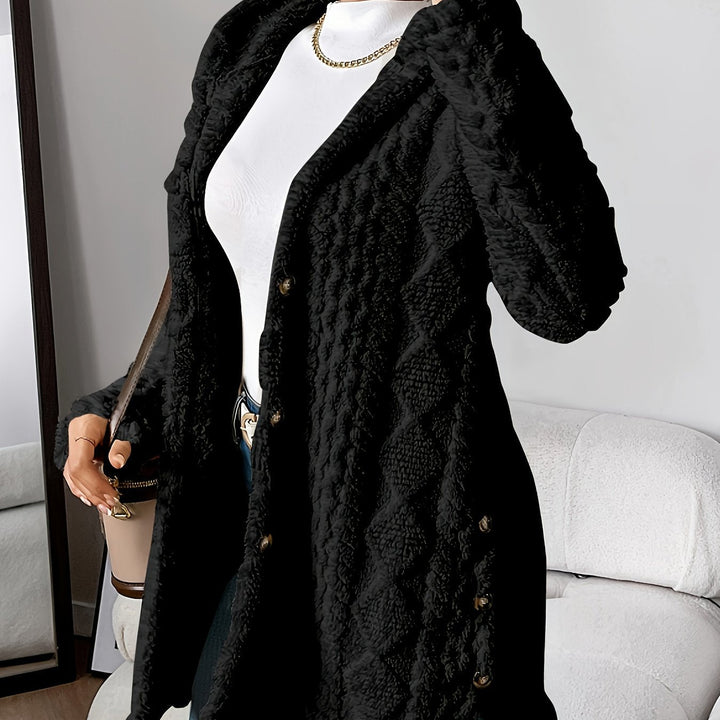 Loose-fit women's hooded long cardigan, providing ultimate comfort and chic fall fashion.