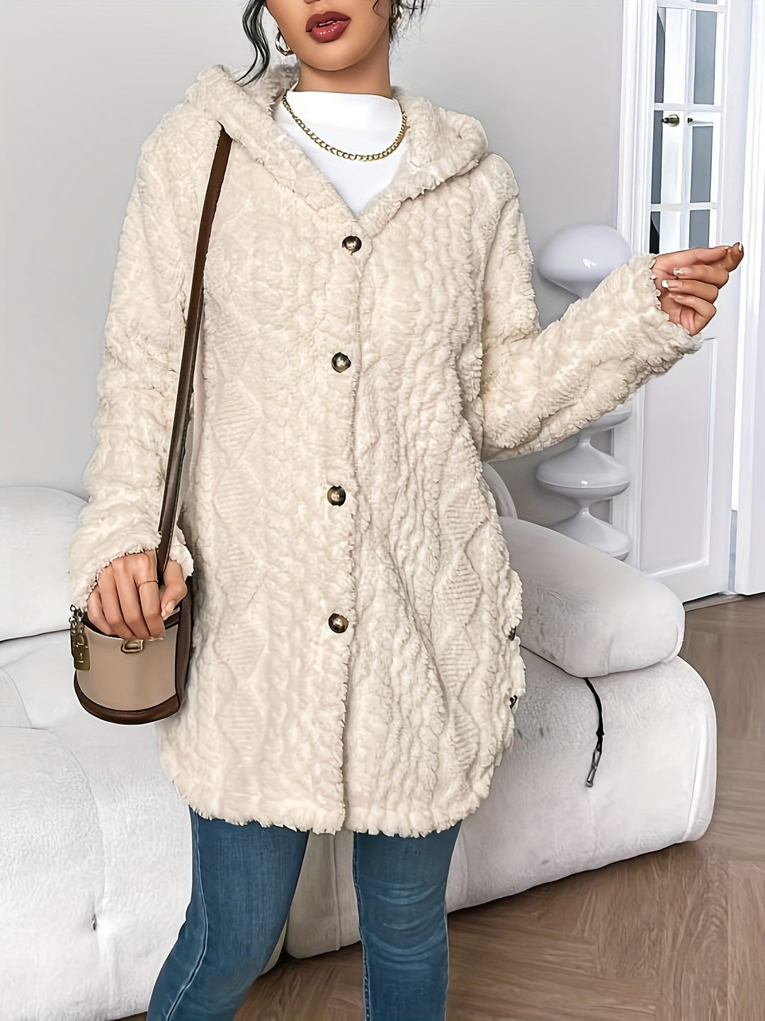 Warm women's hooded long cardigan, a comfortable and stylish addition to your winter wardrobe.