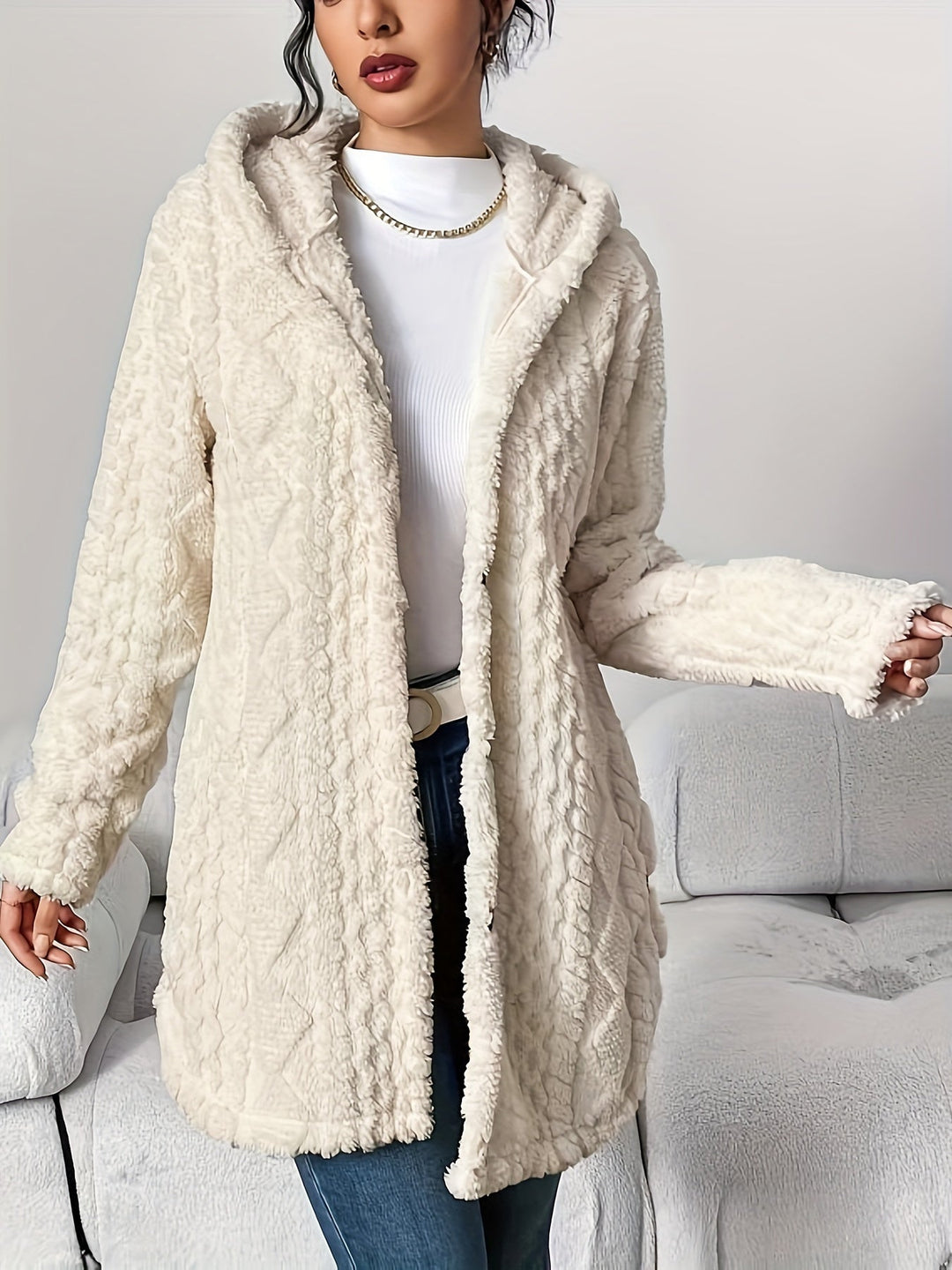 Elegant women's soft long hooded cardigan, perfect for stylish layering on cool days.
