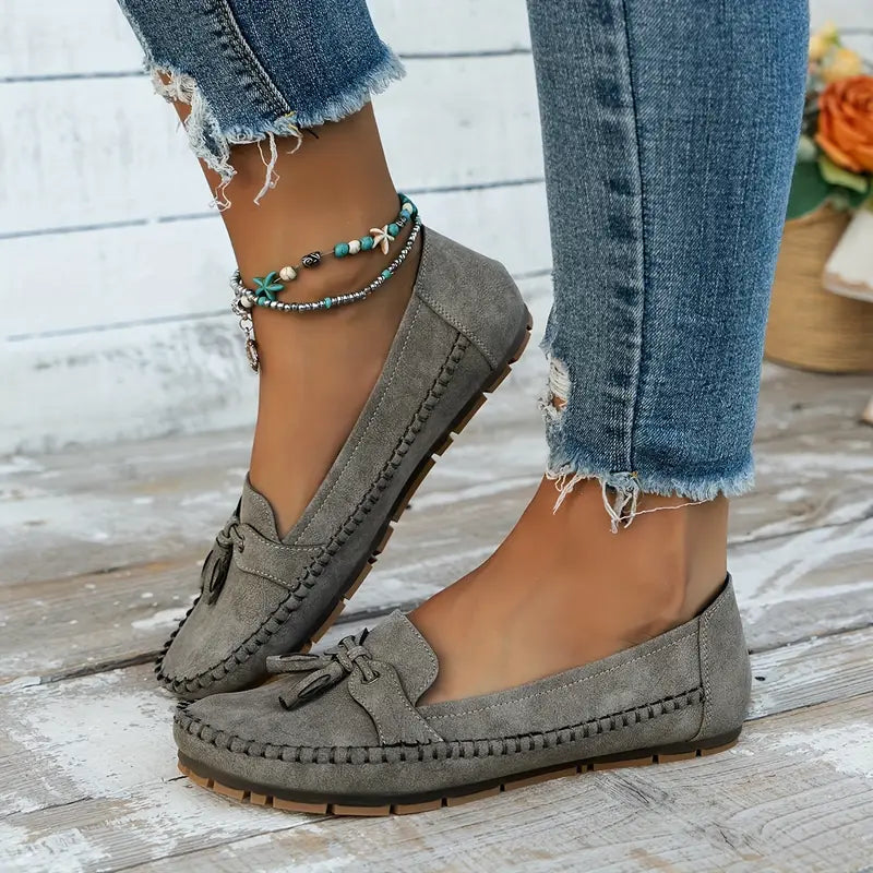 Women's walking loafers with cushioned insole & flexible sole for superior comfort.