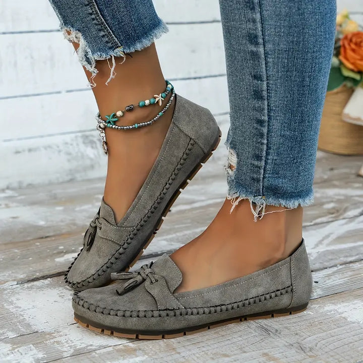 Women's walking loafers with cushioned insole & flexible sole for superior comfort.