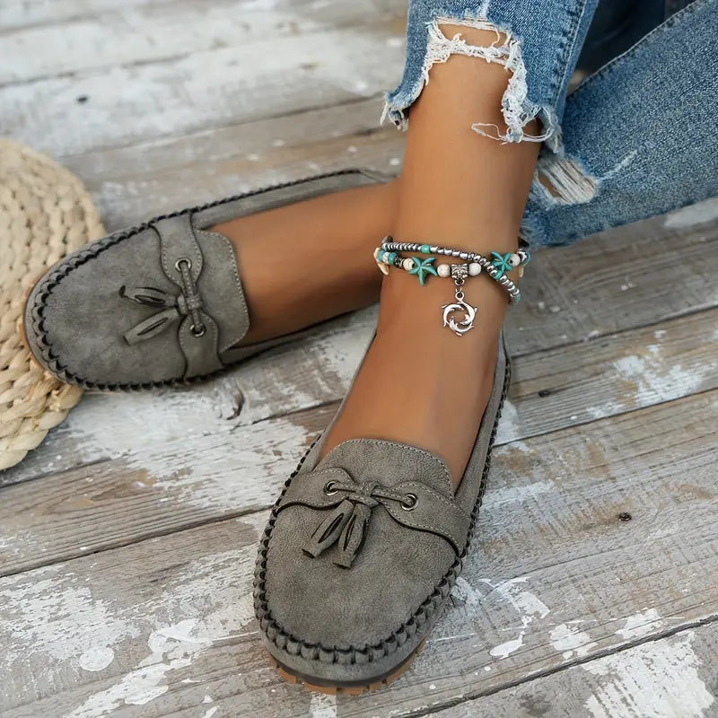 Classic women's slip-on loafers, flexible sole & soft material, perfect for walking.